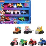 PATRULLA CANINA - LA SUPERPELÍCULA - Pack Patrulla Canina 7 Figuras de los Pup Squad Racers - con un Coche de Juguete Inédito de Liberty Patrulla Canina -...